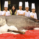 Illustration for article titled Chinas Monster Fish Ends Up in a Cheesy Photo Op